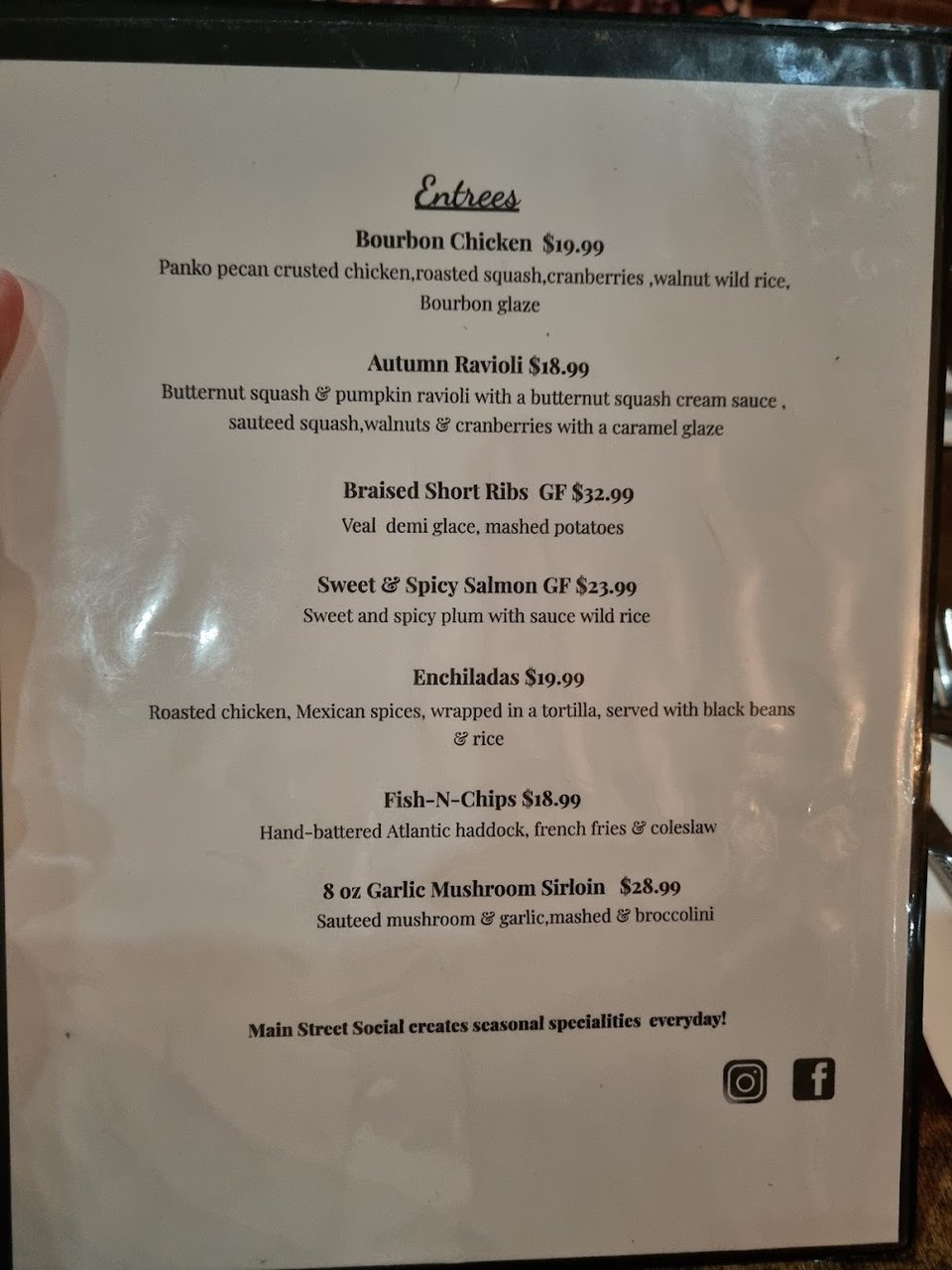 Close-up of a menu page with starters.